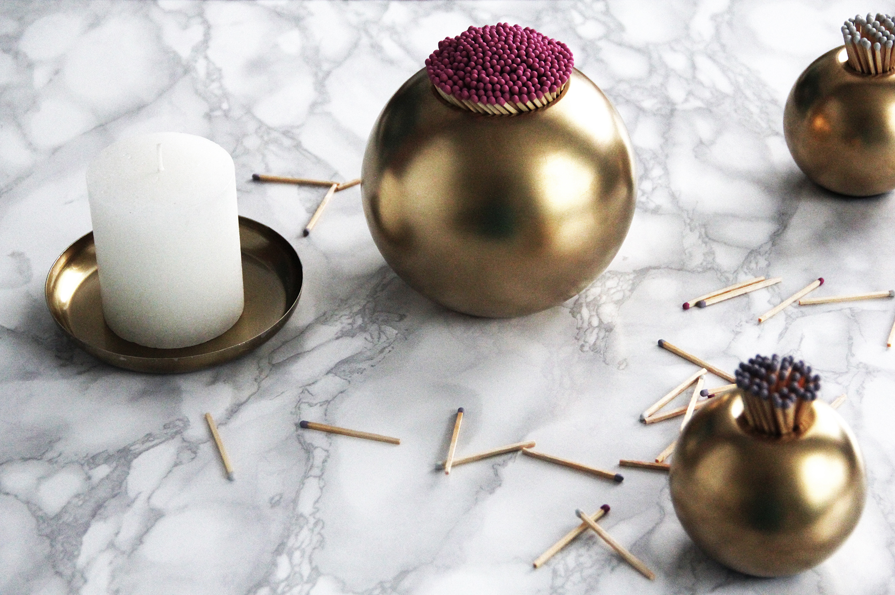Preciously Me blog : DIY - Gold Match Stiker inspired by Aerin brass Sphere Matchstriker. Ikea hack using Nassjo candle holder