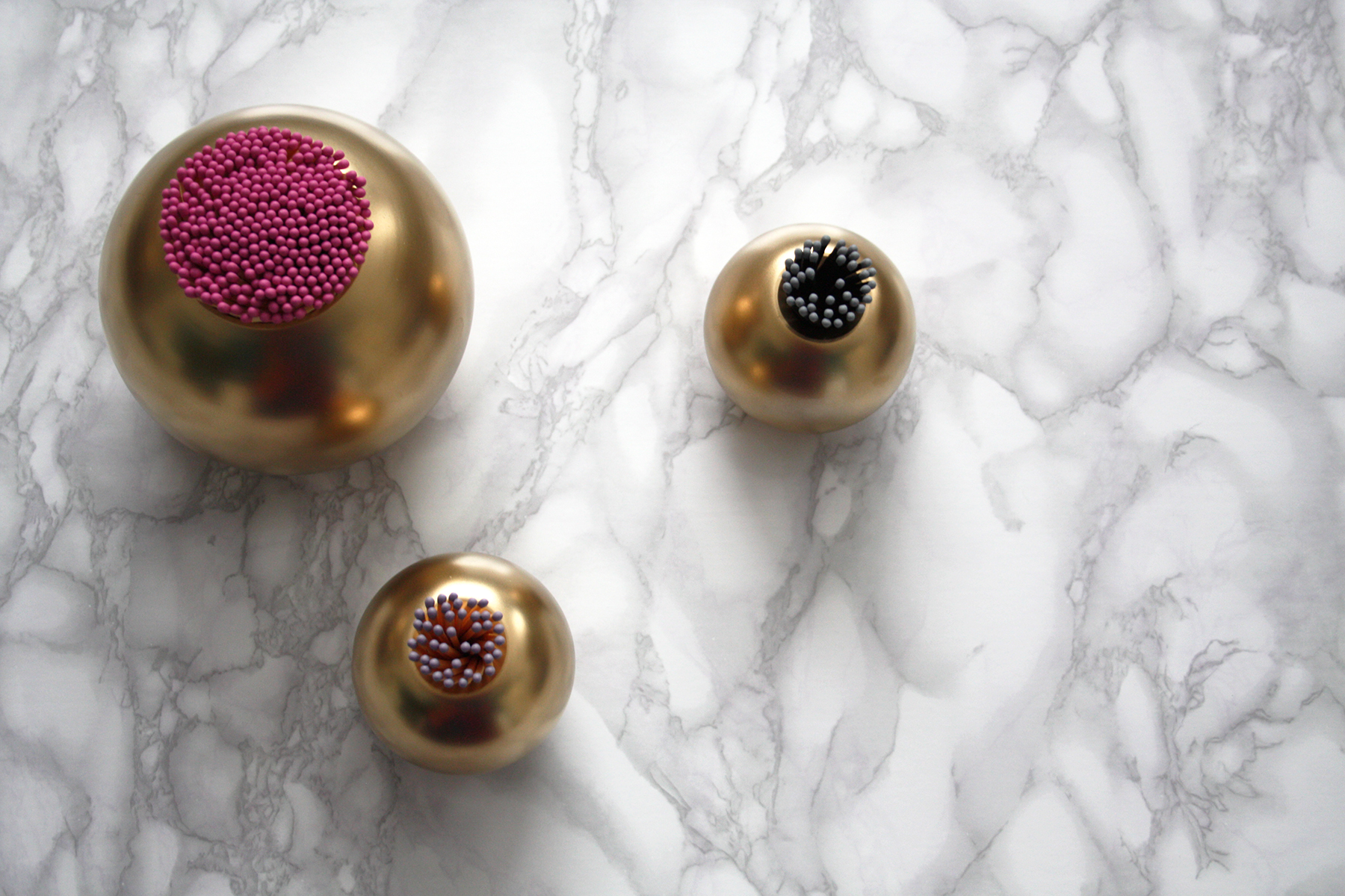 Preciously Me blog : DIY - Gold Match Stiker inspired by Aerin brass Sphere Matchstriker. Ikea hack using Nassjo candle holder