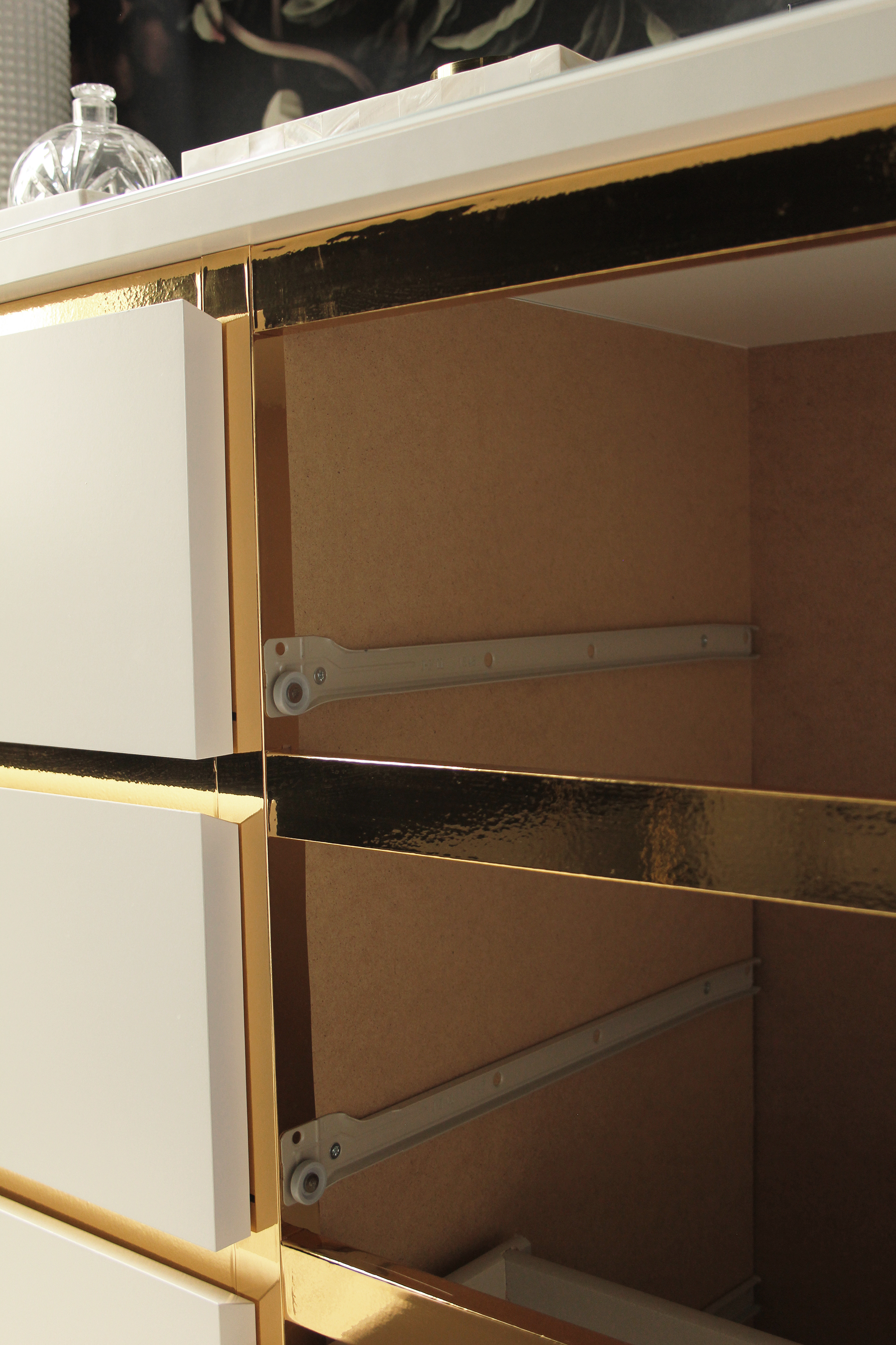 Preciously Me blog : DIY - Ikea Hack, Customize and Glamorize a Malm dresser with gold contact paper. Looks like a beautiful vintage style credenza